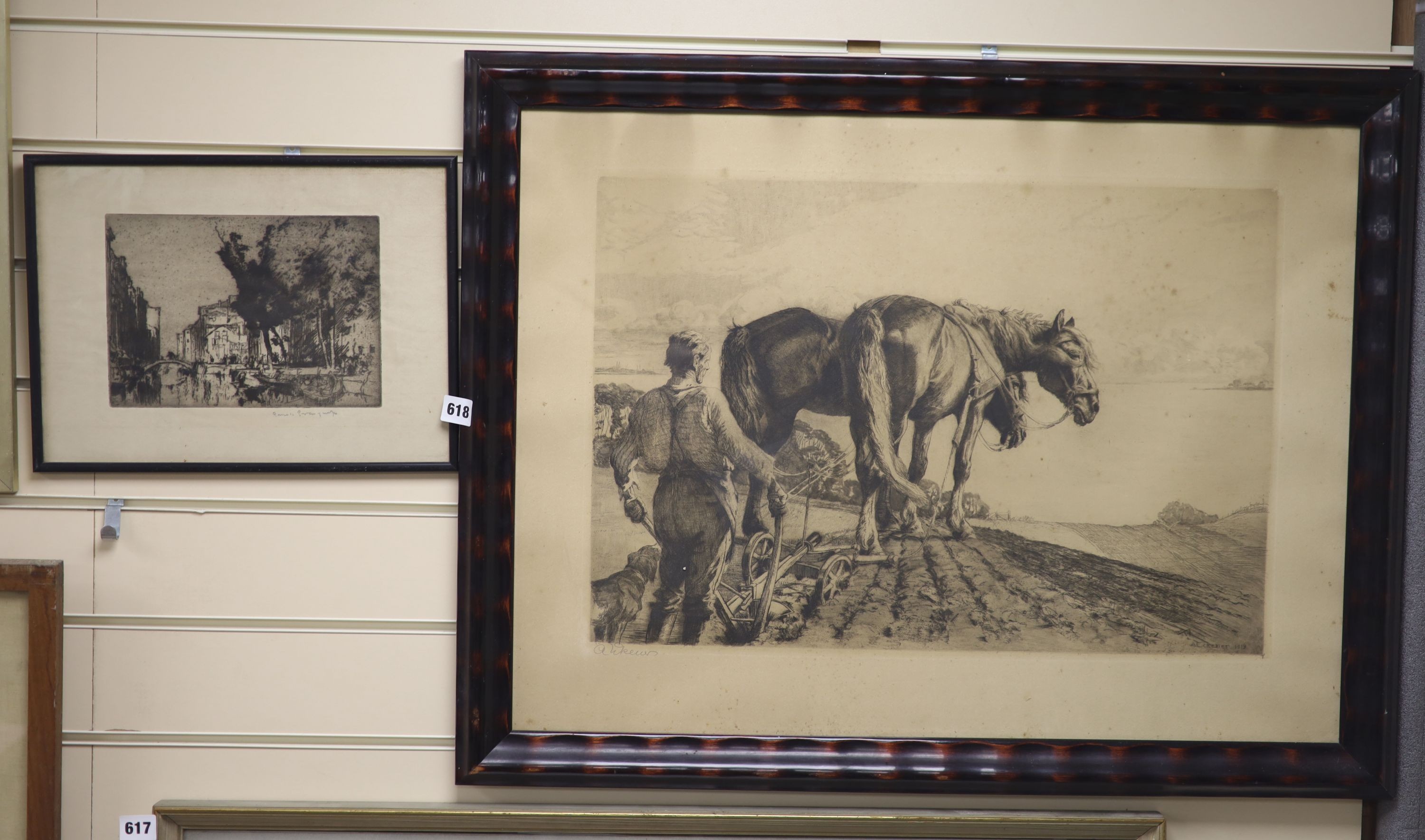 Frank Brangwyn (1867-1956) - drypoint etching, ‘’Town canal with bridge’’, signed in pencil, 16 x 23cm. and A. Eckener - an engraving of a figure ploughing, signed in pencil, 40 x 58cm. (2)